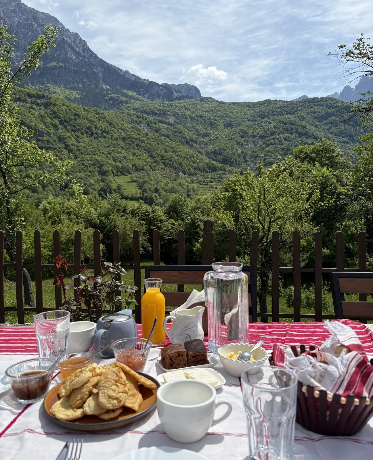 Breakfast on the terrace with the valley behind
